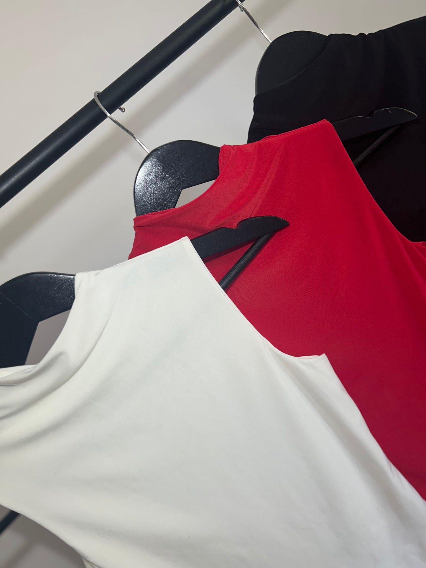SLINKY HIGH NECK GATHERED ASYMMETRICAL HEM TOP