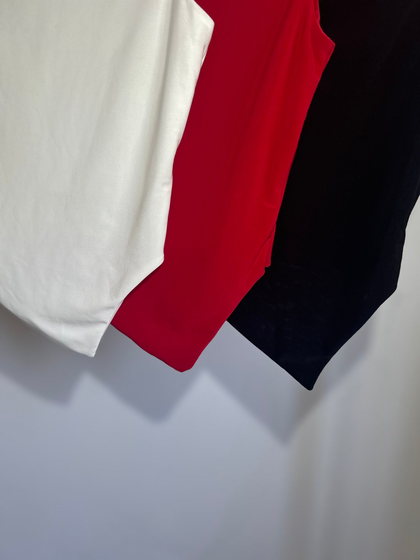 SLINKY HIGH NECK GATHERED ASYMMETRICAL HEM TOP