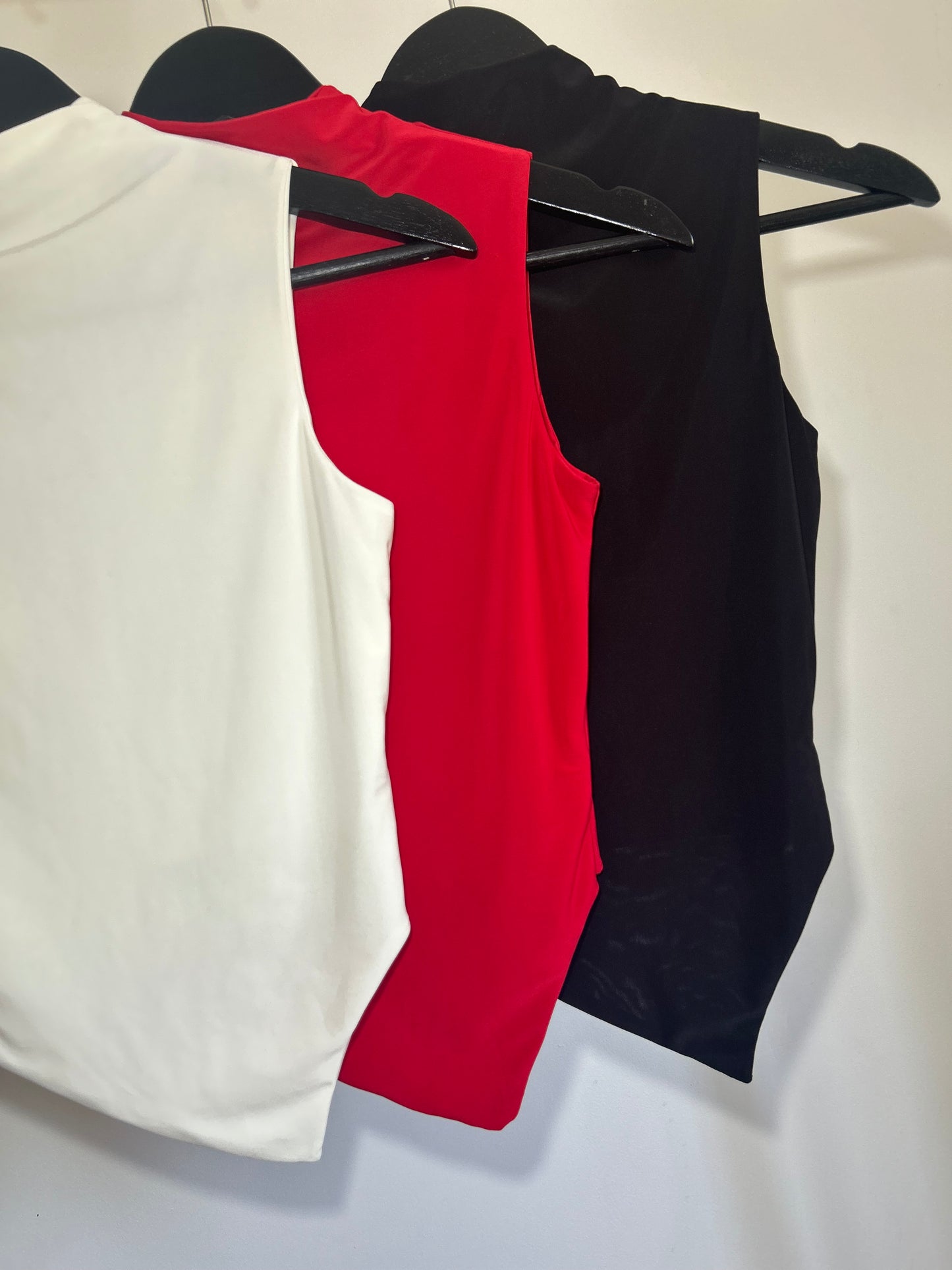 SLINKY HIGH NECK GATHERED ASYMMETRICAL HEM TOP